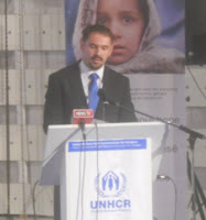 Tomic, minister per komunitete